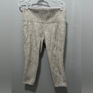 Athleta salutation slash capri leggings in grey cheetah print